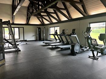 Well-equipped fitness center at Aspen Ridge Apartments, West Chicago
